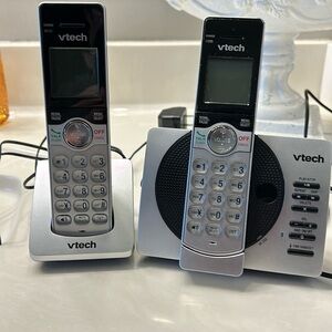 Vtech rechargeable cordless phone set with answering machine.